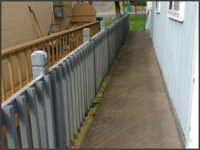 Replaced siding and railing: before